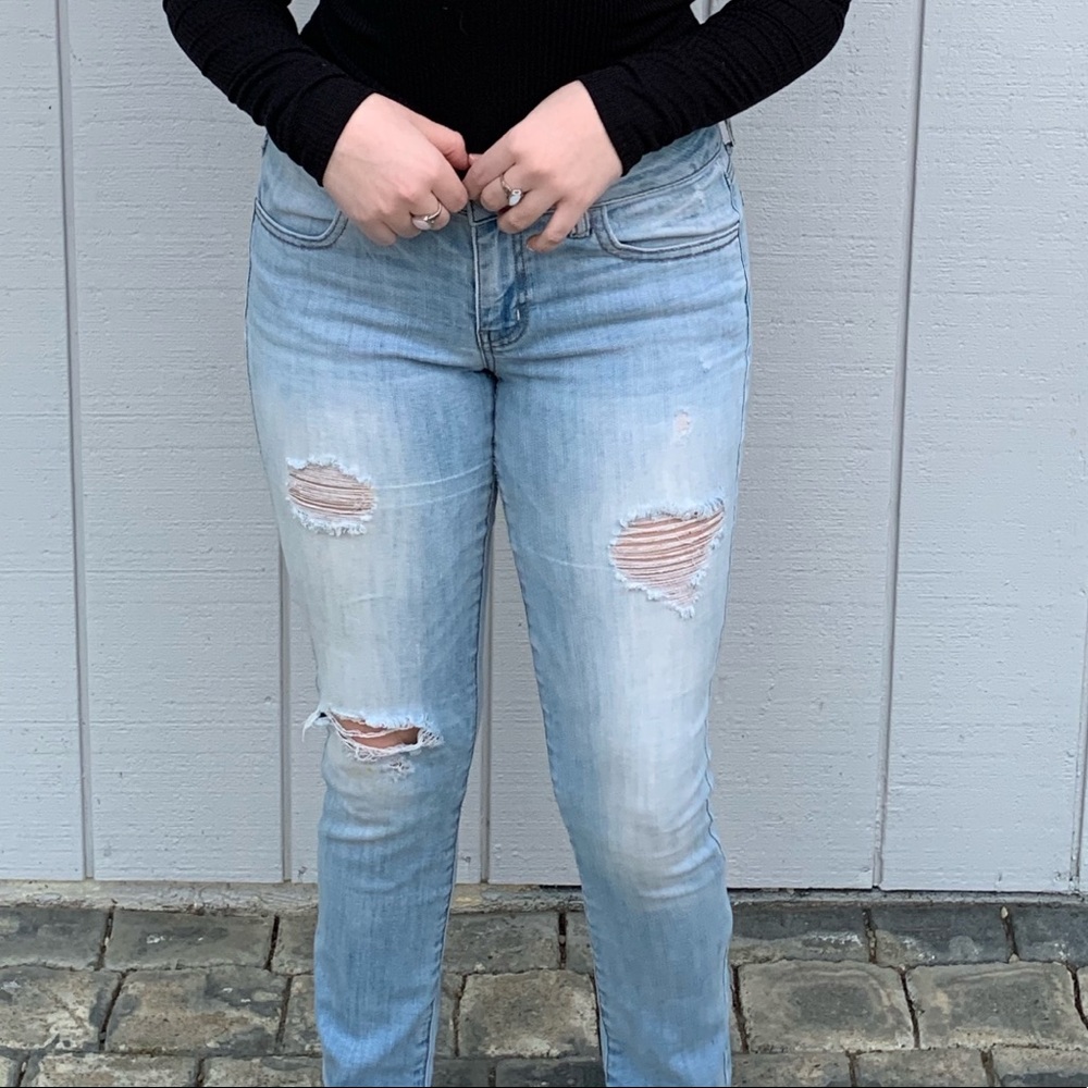 Light blue ripped jeans